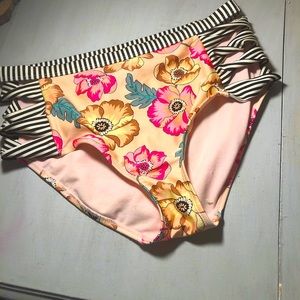 Floral colorful high-waisted swim bottoms.